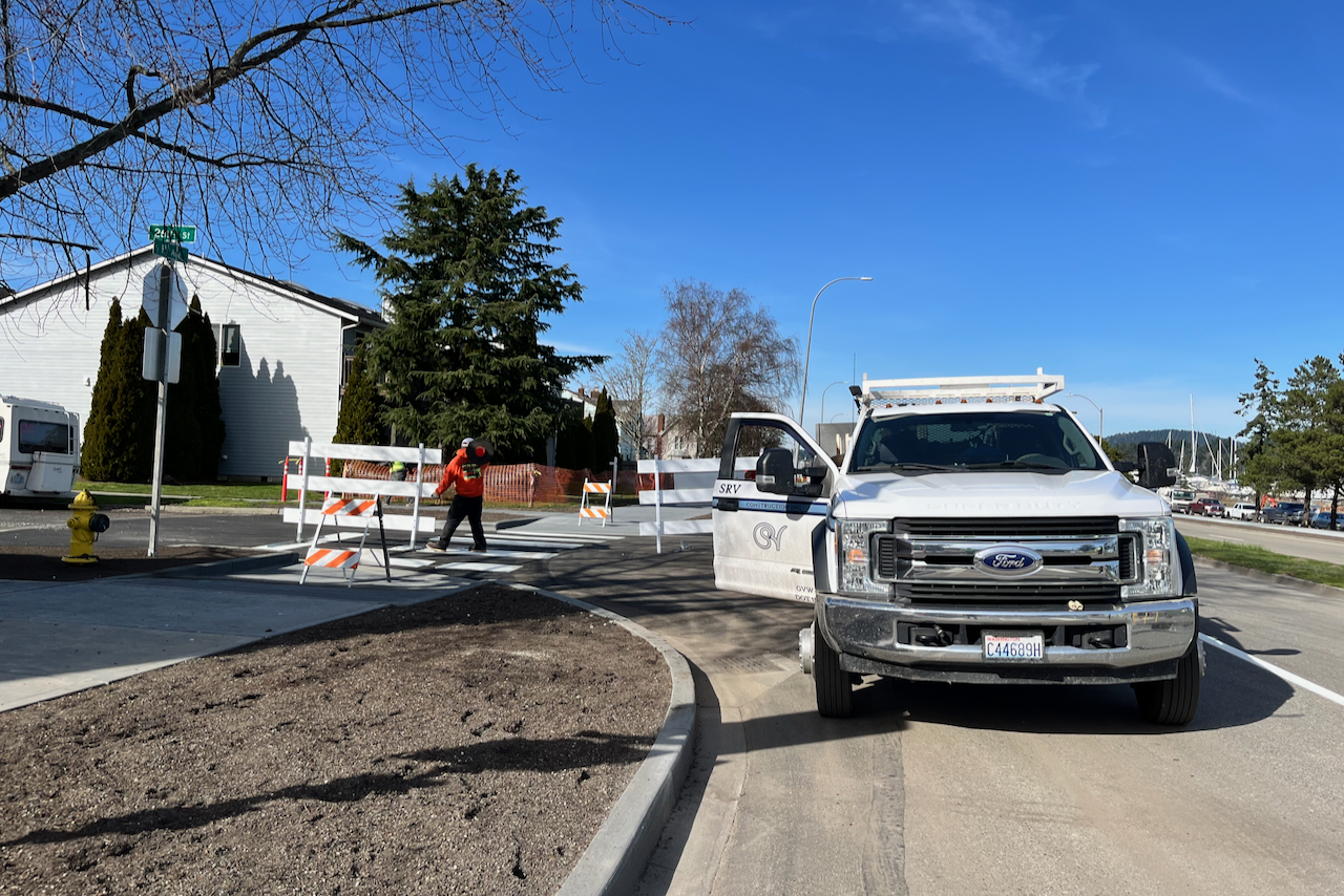 Crews remove barriers on R Avenue